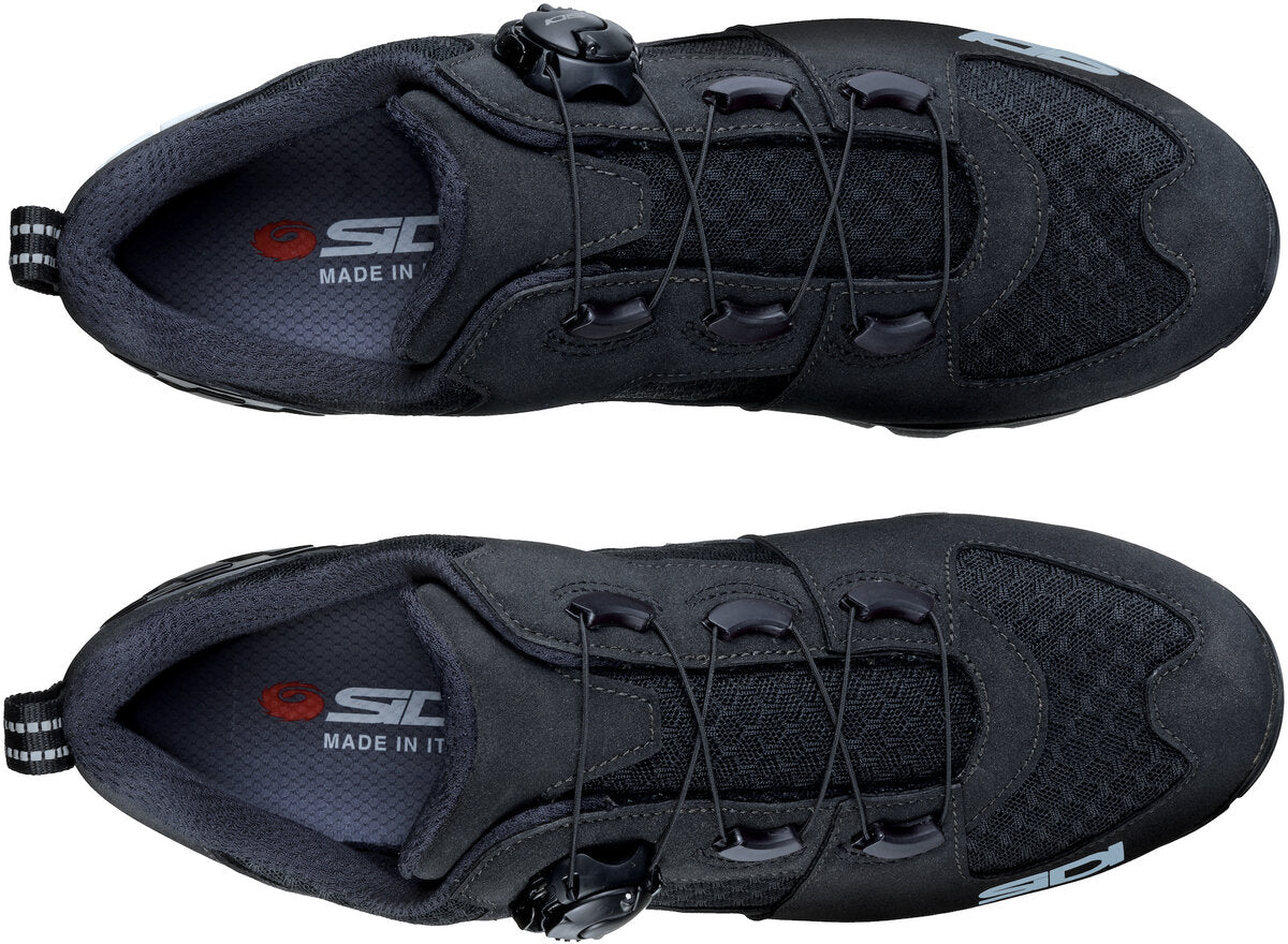 Two black shoes from the top view with SIDI logo on the inner sole and dial laces.