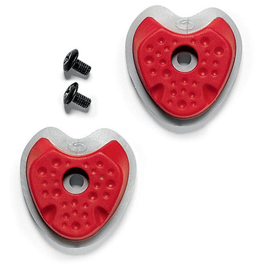 Two red anti-slip pedal covers with silver edges and screws on a white background