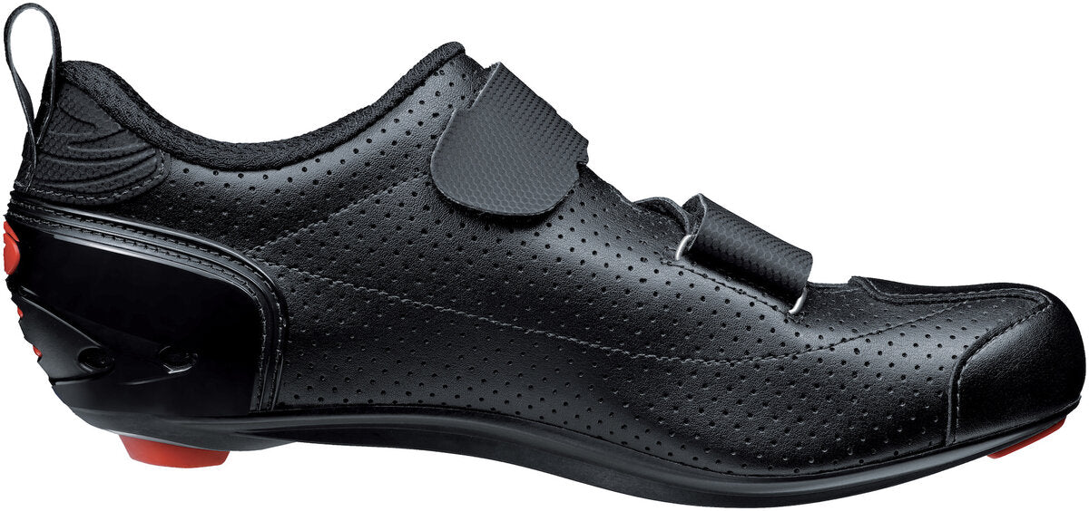Black cycling shoe with a strap on a white background