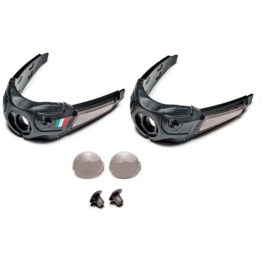 Black shoe heel parts with additional components on a white background