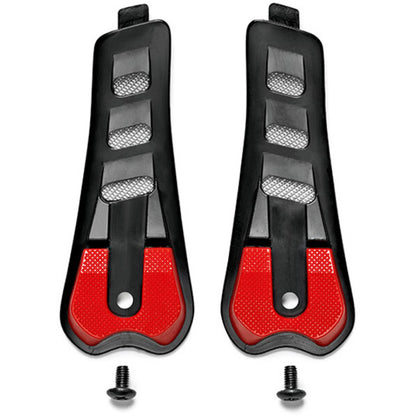 Pair of black and red heel slip guards with screws on a white background
