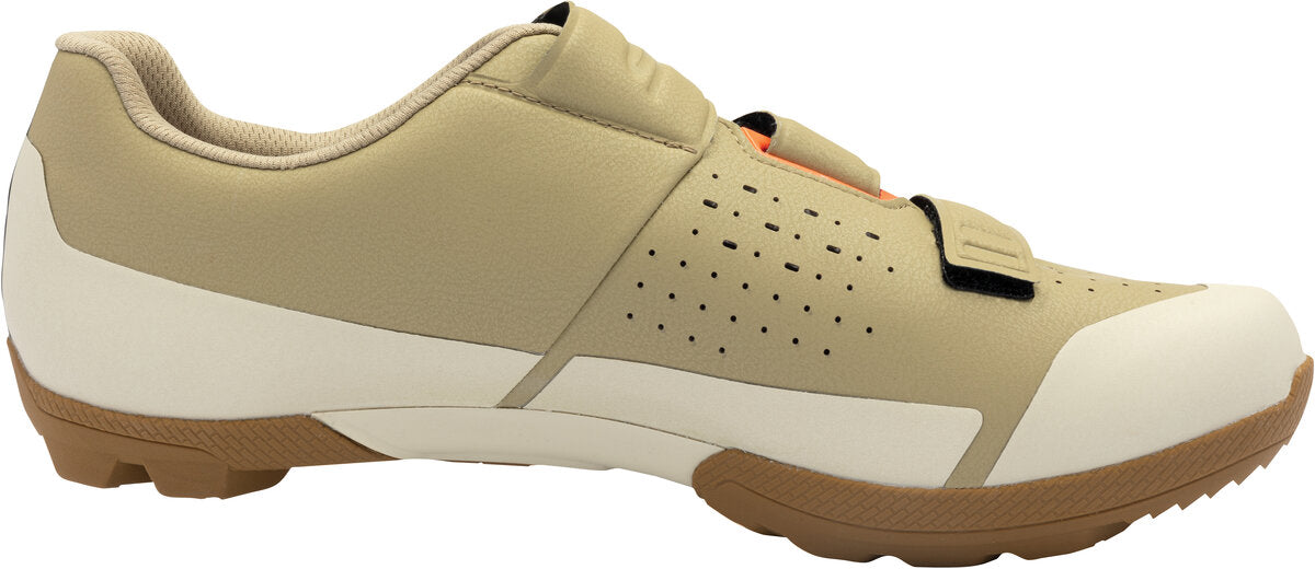 Beige cycling shoe with white sole on a white background