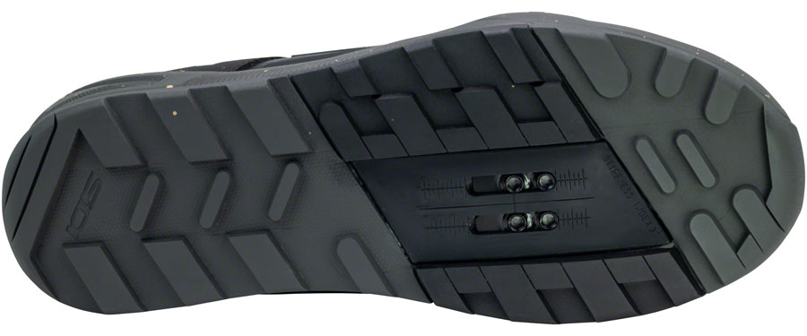 Close-up of a black shoe sole with tread pattern