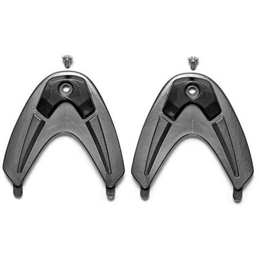 Two black toe insert panels with screws on a white background