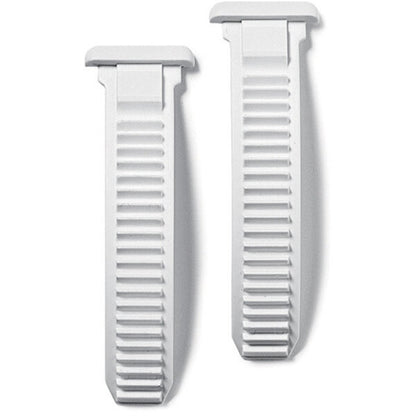 Two white plastic straps with textured surface on a white background