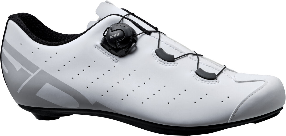 White cycling shoe with black accents on a white background
