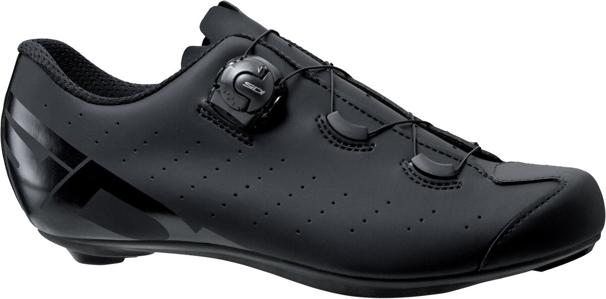 Black cycling shoe on a white background