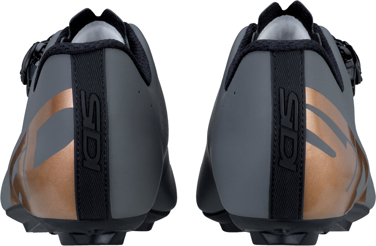 Pair of cycling shoes with brand logo on a white background