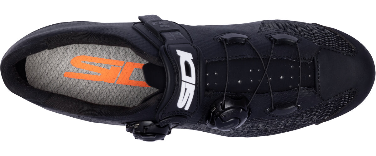 Black cycling shoe with orange logo on a white background