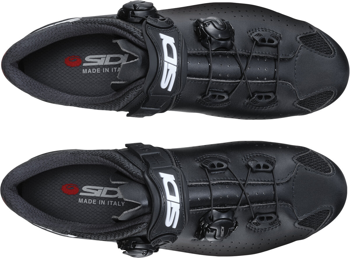 Black cycling shoes with Sidi branding on a white background