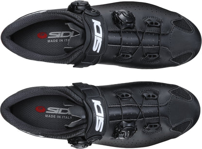 Black cycling shoes with Sidi branding on a white background