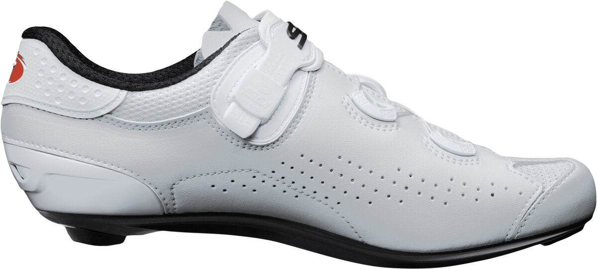 White cycling shoe with a black sole on a white background