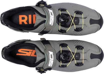 Gray cycling shoes with orange and black branding on a white background