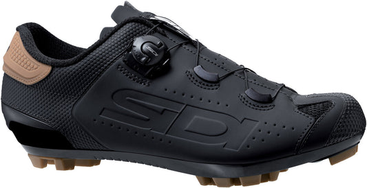 Black cycling shoe with brown accents on a white background