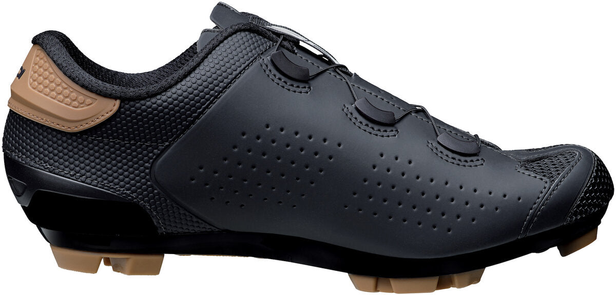 Black cycling shoe with brown accents on a white background