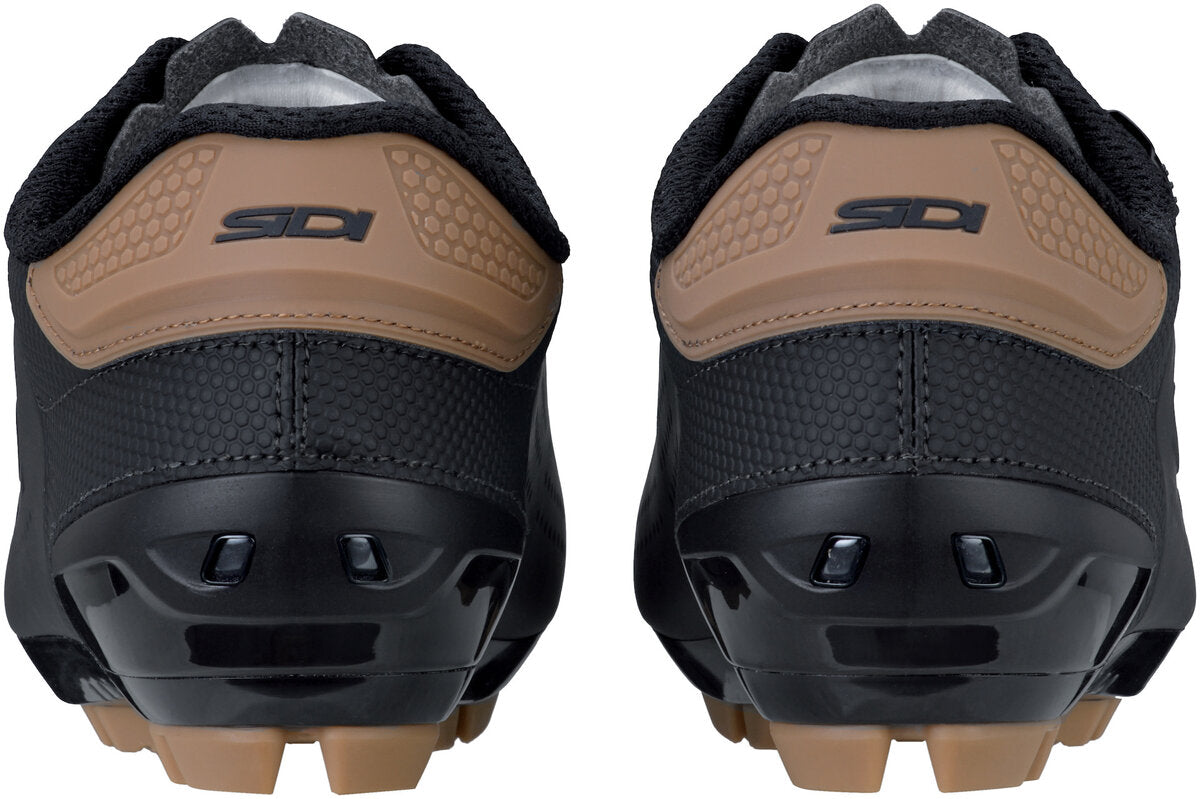 Black and brown shoes with 'SIDI' logo on a white background