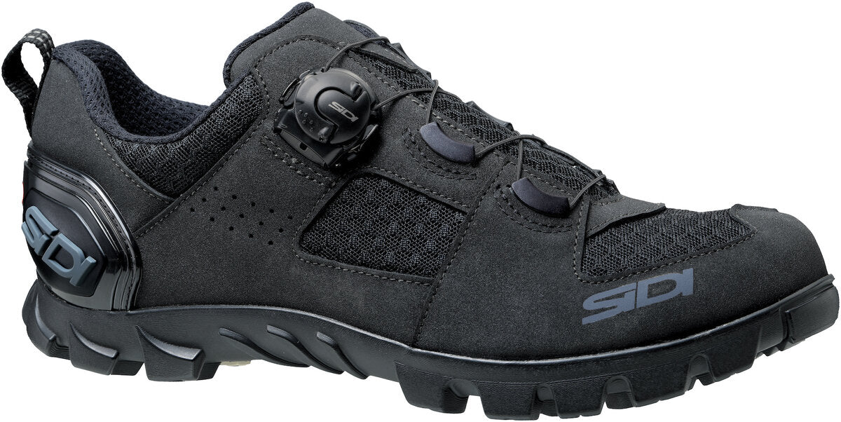 Black shoe from the side with dial lace technology and SIDI logo in grey