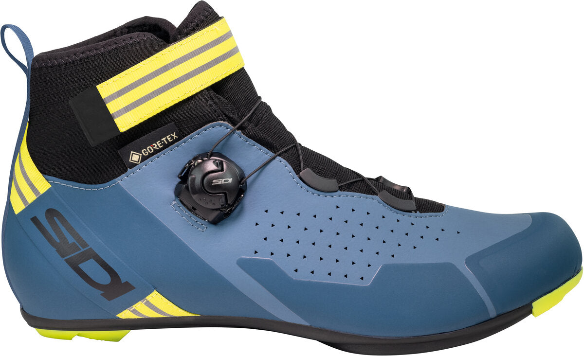 Blue cycling shoe with yellow accents on a white background
