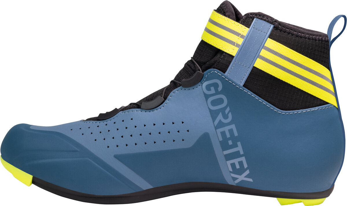Blue cycling shoe with yellow accents and Gore-Tex branding on a white background
