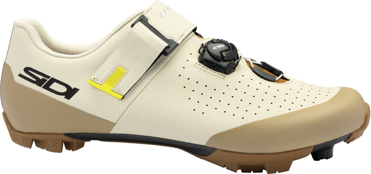 Beige cycling shoe with brown sole on a white background