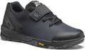 Black cycling shoe from side view with open velcro strap and SIDI logo on it