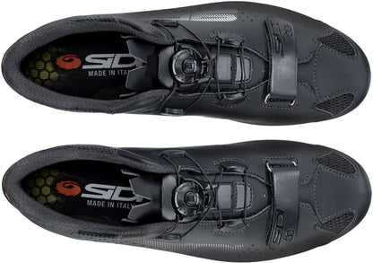Pair of black cycling shoes with Sidi branding on a white background