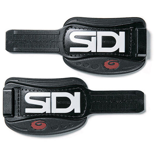 Two black Sidi shoe straps on a white background