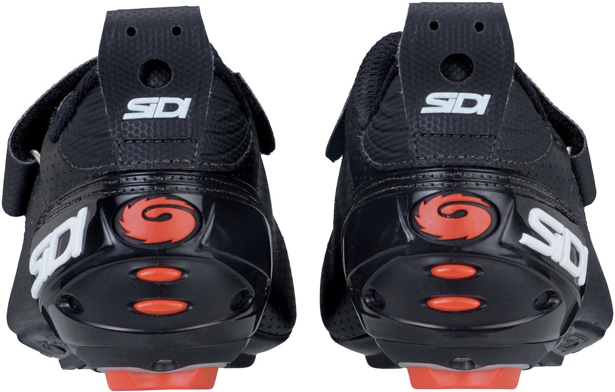 Black knee pads with red accents and Sidi logo on a white background