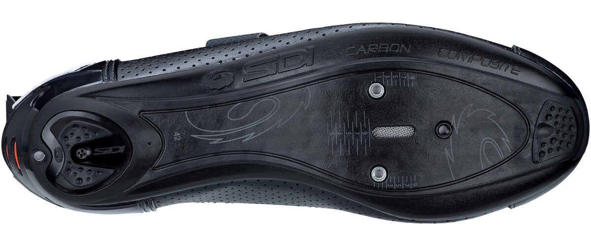 Black cycling shoe sole with brand logos on a white background
