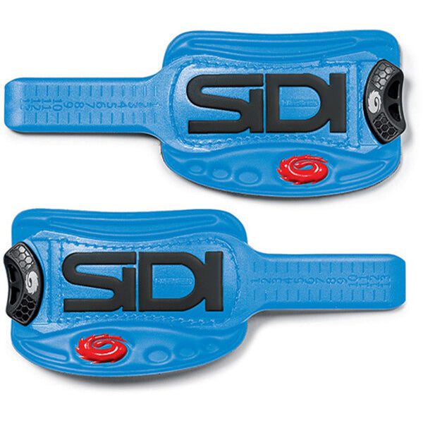 Two blue Sidi shoe straps on a white background
