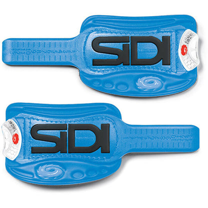Two blue Sidi shoe straps on a white background