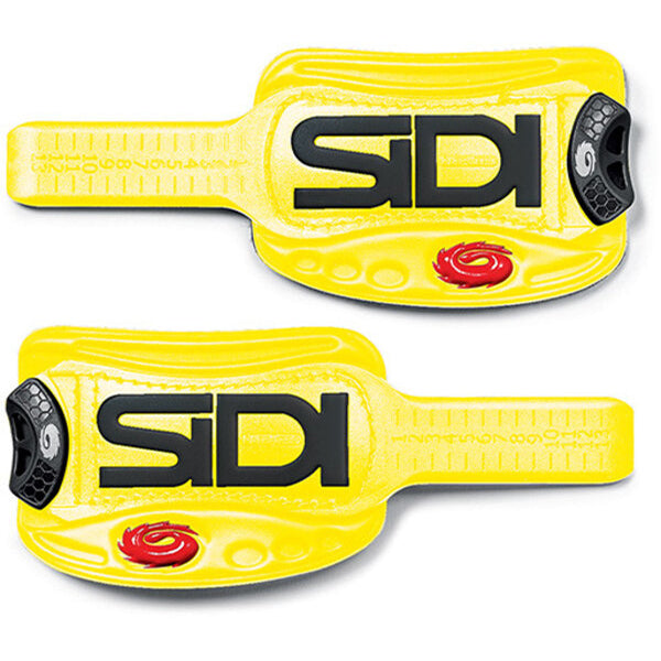 Yellow shoe straps with SIDI branding on a white background