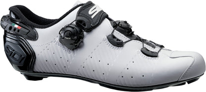 White cycling shoe with black accents on a white background