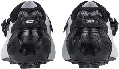 Pair of black and white cycling shoes with Sidi branding on a white background