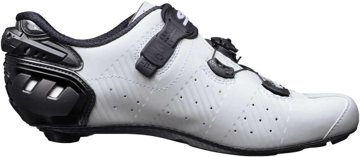 White cycling shoe with black accents on a white background