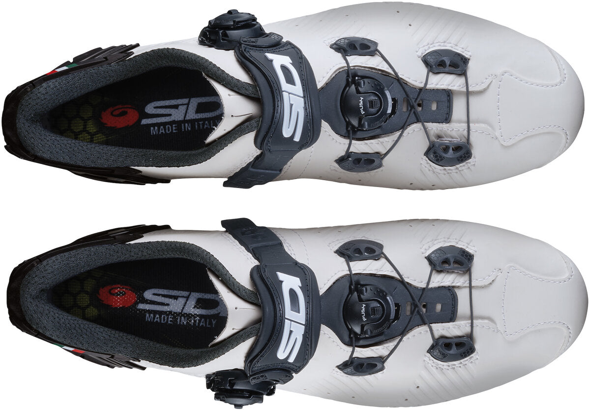 White cycling shoes with black accents and Sidi branding on a white background